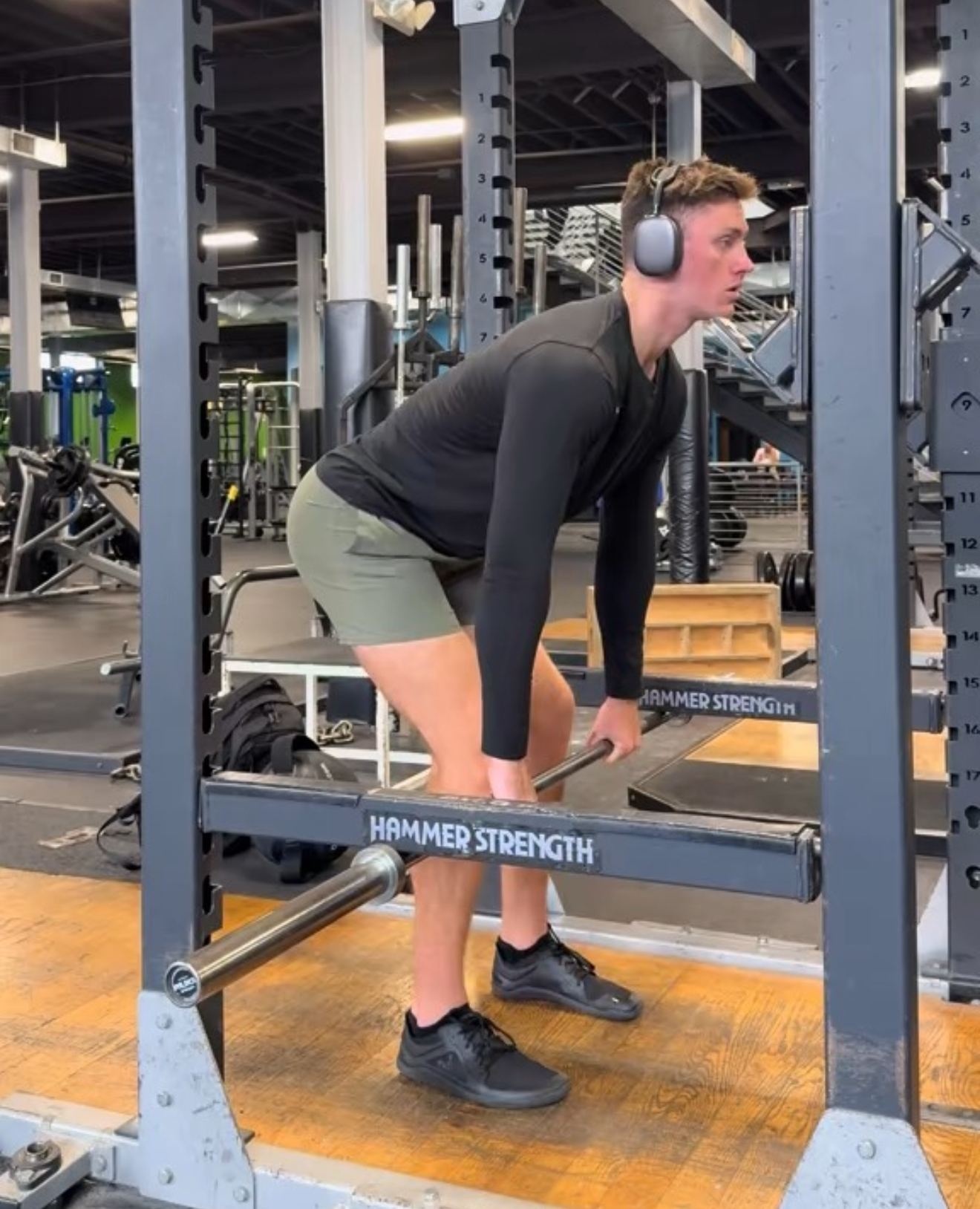 Baseball pitcher performing overcoming isometric deadlift for high-velocity pitching training
